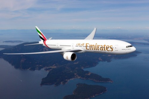 Emirates Boeing 777-300ER photographed from Wolfe Air Aviation's Lear 25B.